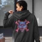 Woman wearing classic fit hoodie with bold back graphic