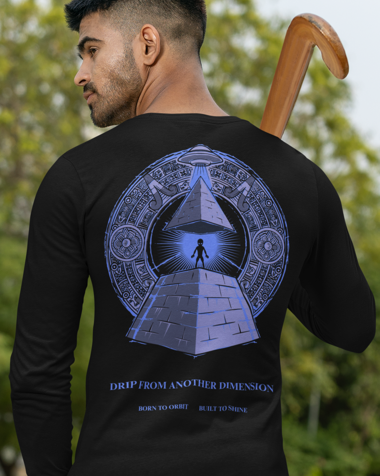 black long-sleeve shirt with a pyramid design on the back