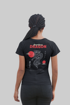 Black t-shirt with a dragon design and text on the back