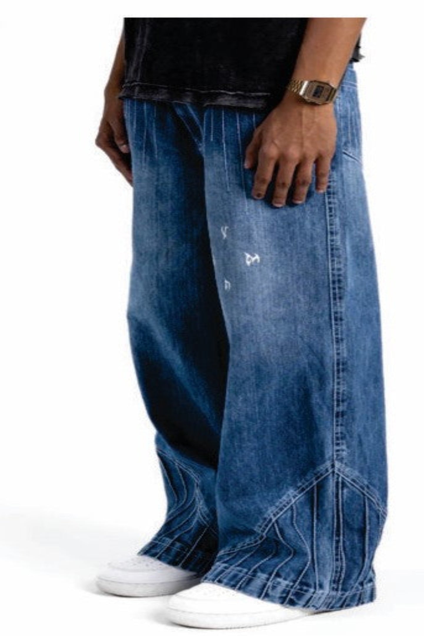 Person wearing long blue jeans on a white background