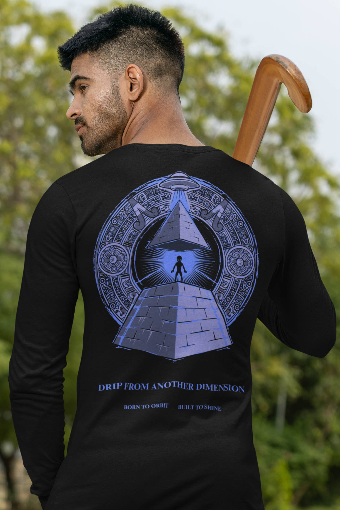 black long-sleeve shirt with a pyramid design on the back